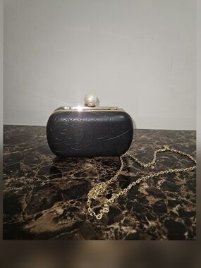 Charming Charlie Black Floral-Embossed Pearl-Clasp Clutch with Gold Chain